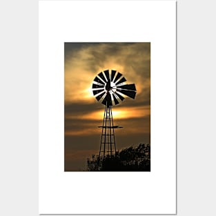 Kansas Windmill silhouette Sunset with a colorful sky. Posters and Art